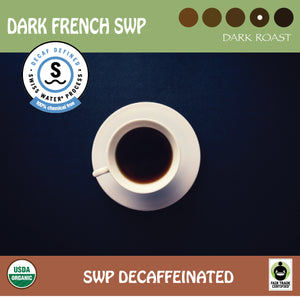 Black coffee in a white mug. The Swiss Water Process, USDA organic, and Fairt Trade cerified logos. 