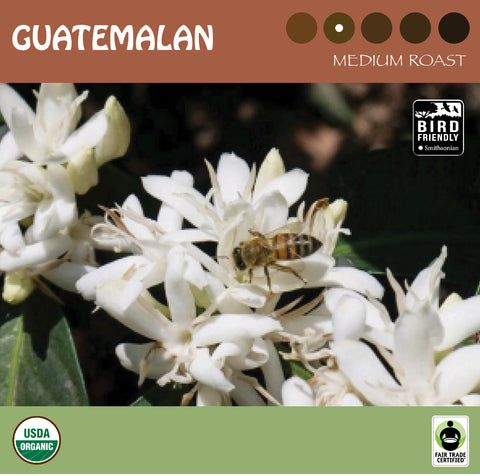 A bee on a white coffee blossom.Signature's medium-roast coffee from Guatemala.  Bird friendly, USDA organic and Fair Trade-certified logos. 