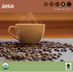 An orange mug with steam representing Signature's JahVa Blend dark roast coffee. USDA organic and Fair Trade-certified logos.