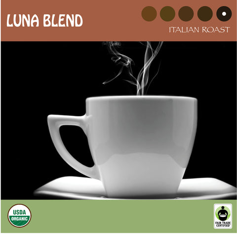 A white coffee mug with steam against a black background.  Representing Signature's  italian roast Luna Blend. USDA organic and Fair Trade Certified logos. logo.
