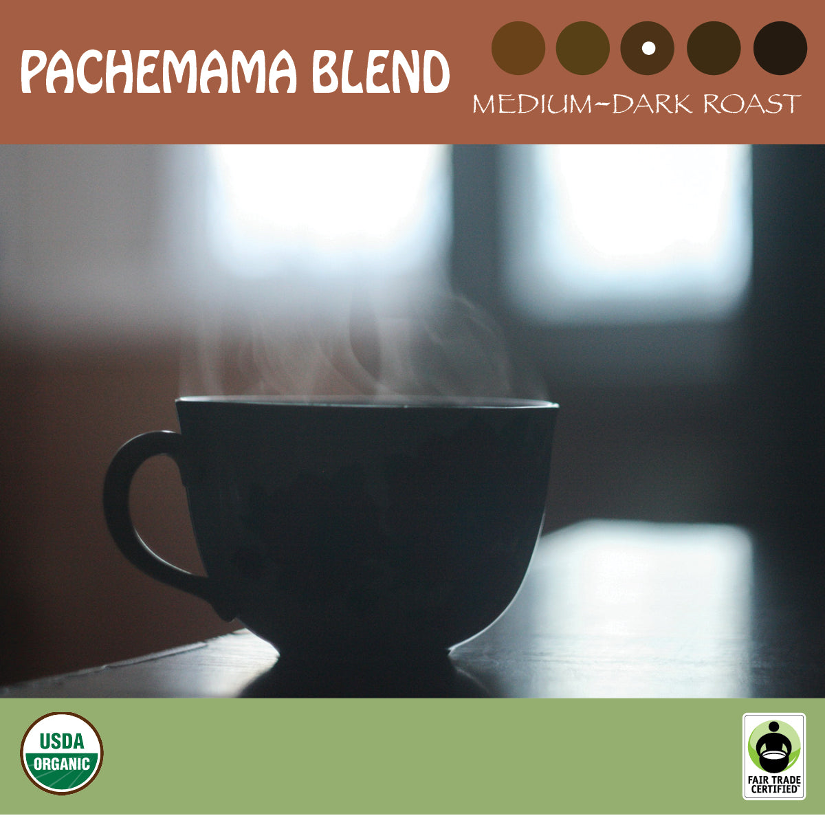 A black mug of steaming coffee on a table against a blurred background. Representing Signature's medium-dark Pachemama Blend. USDA organic and Fair Trade Certified logos.